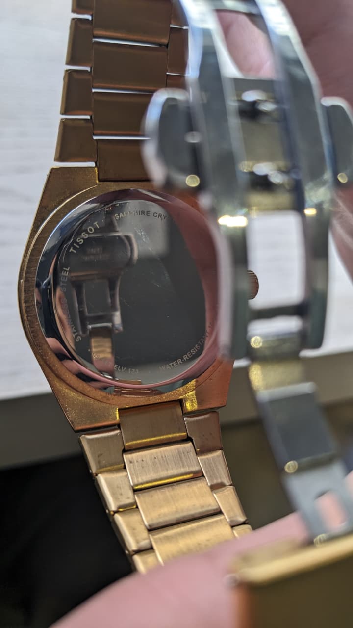 Elegant Tissot Gold-Tone Quartz Watch with Green Dial