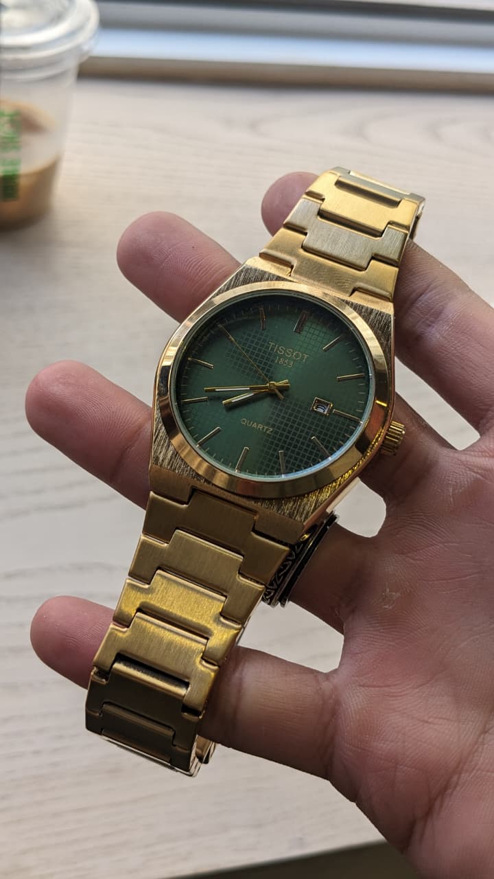Elegant Tissot Gold-Tone Quartz Watch with Green Dial