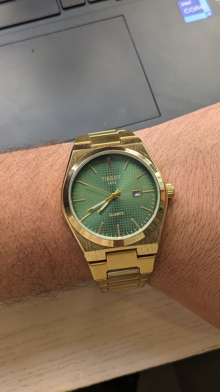 Elegant Tissot Gold-Tone Quartz Watch with Green Dial