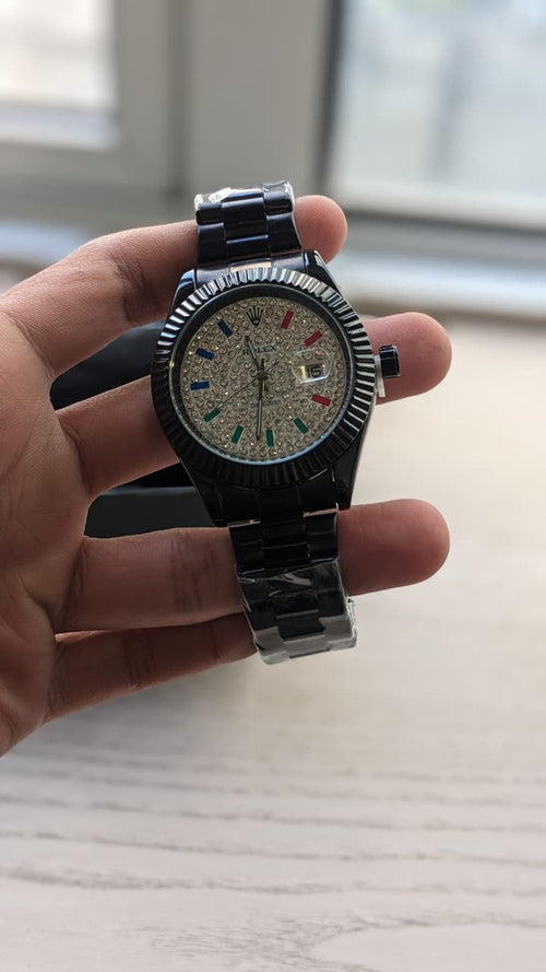 Rolex Datejust with a fluted bezel date window and fully diamond-style dial